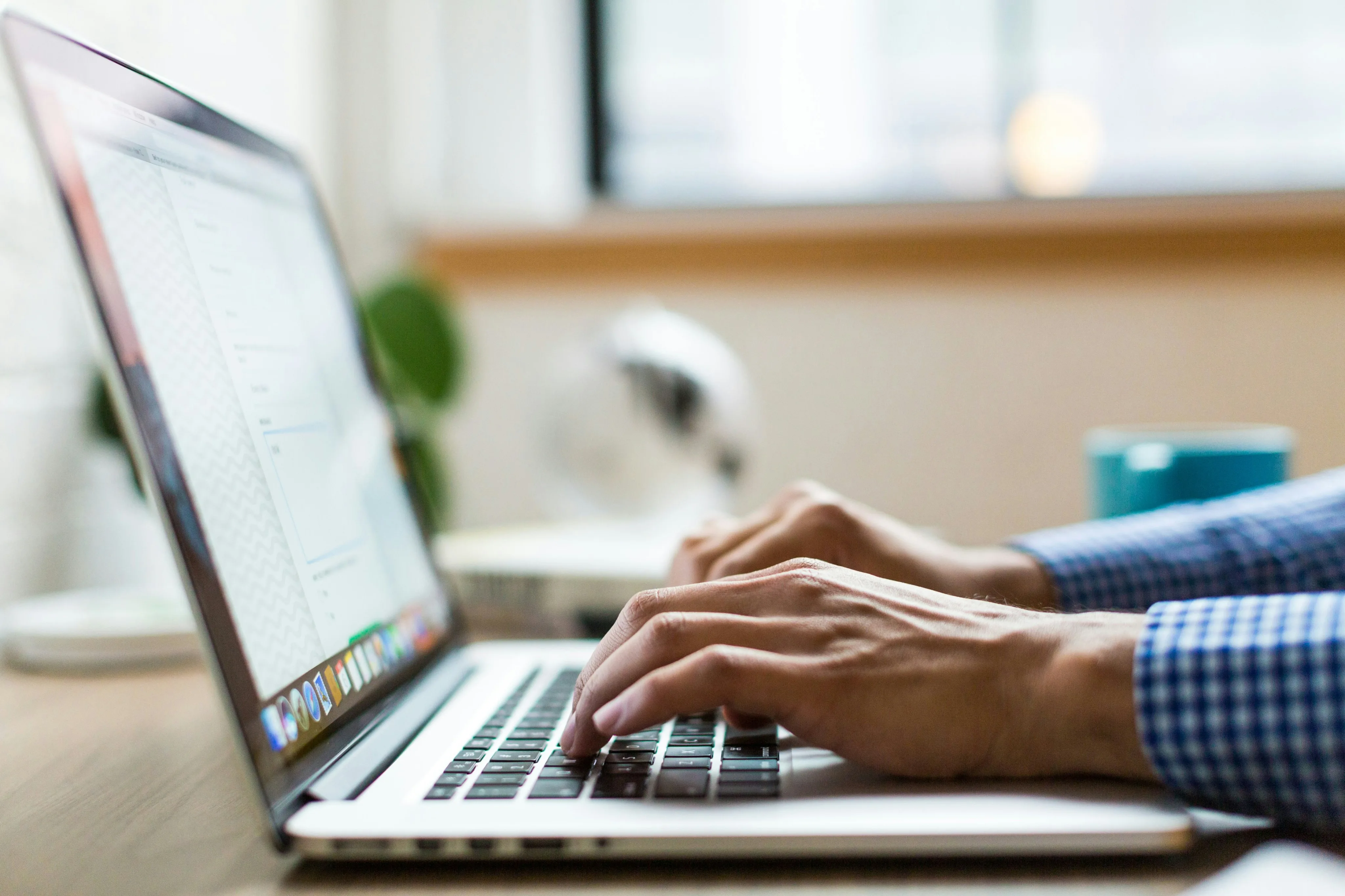 Wealth advisor working on a laptop